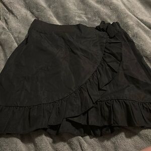 Black ruffle skirt